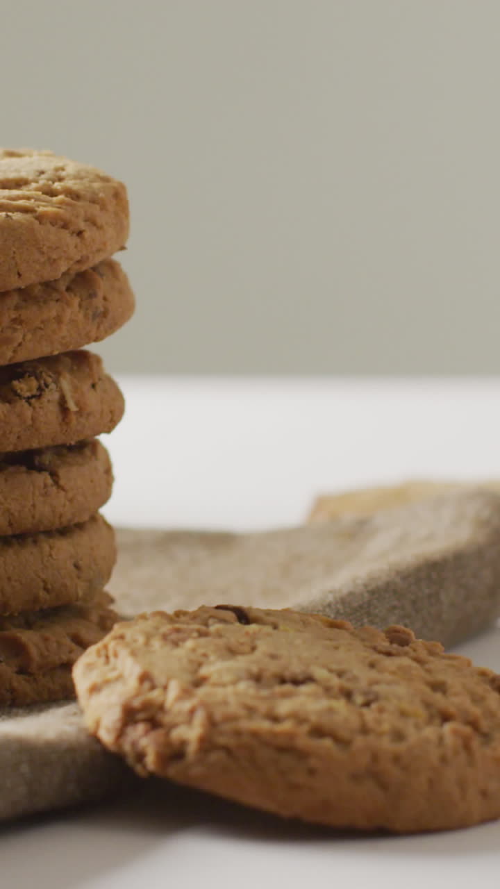 Video of biscuits with chocolate and milk on white background