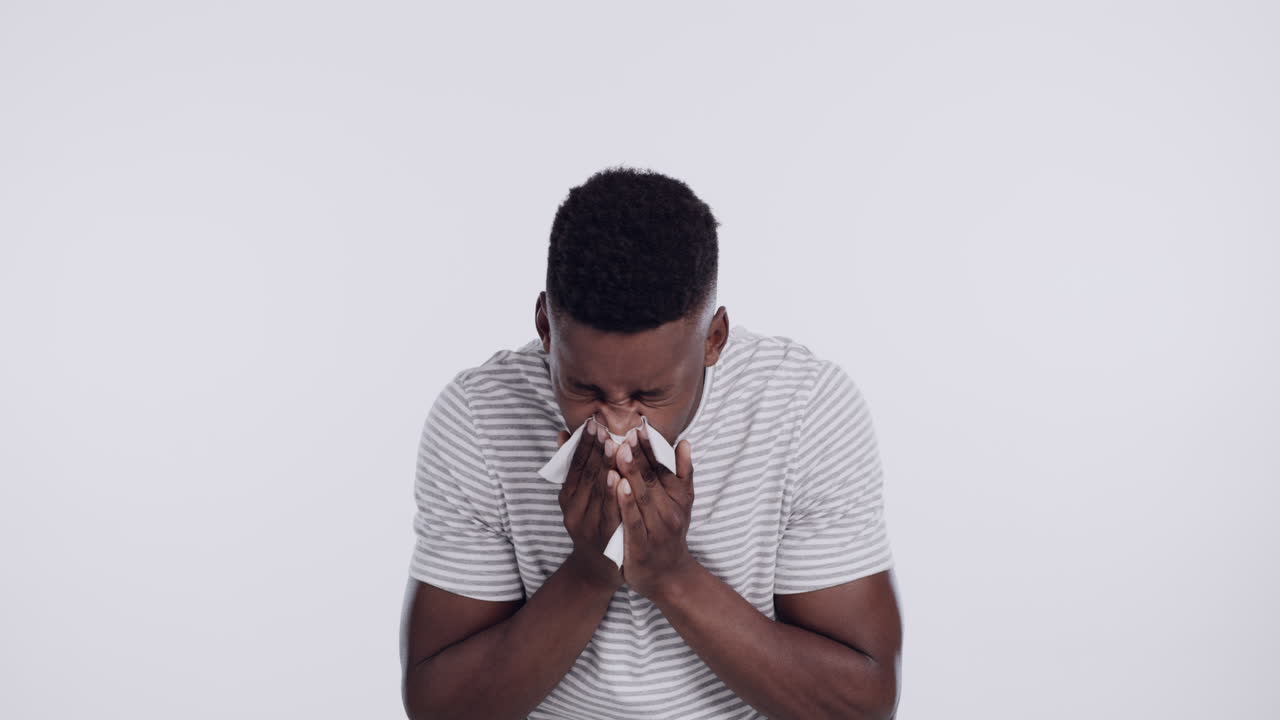 hombre con un resfriado