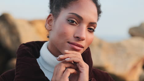 smiling african american girl looking at the camera.