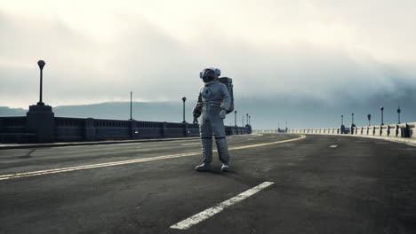 astronaut in space suit on the road bridge