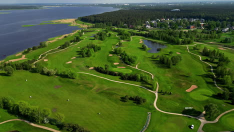 Ozo-golf-club-near-Riga-with-vibrant-green-grass,-aerial-view