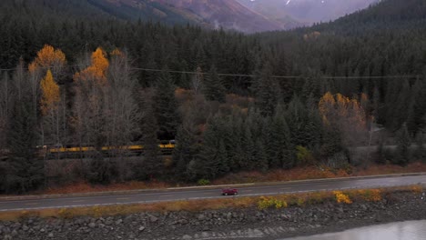beautiful footage of the alaska train heading south alongside the seward highway, in turnagain arm, alaska.