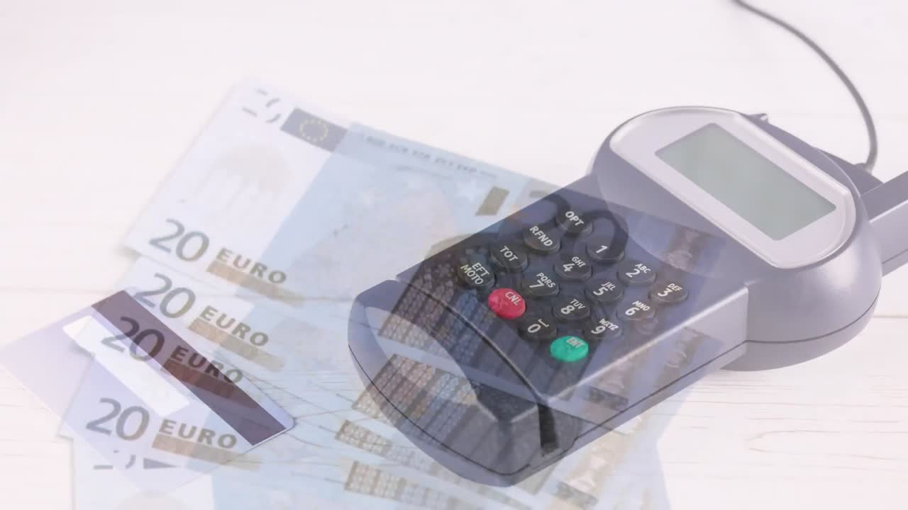 animación de billetes en euros que caen sobre el terminal de pago