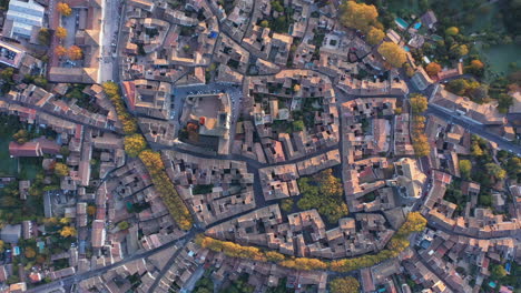 vertical aerial view over uzès south of france gard beautiful village sunrise