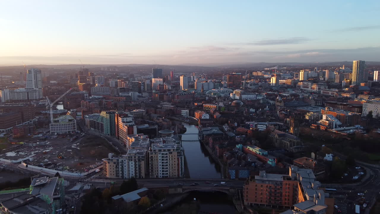 Wide Angle Aerial View of Leeds City at Golden Hour - Dolly Out