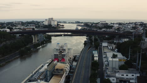 Large-Ship-Dock-Near-The-Bridge-Of-Ramon-Matias-Mella-In-Santo-Domingo,-Dominican-Republic