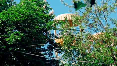 ferris wheel over blue sky