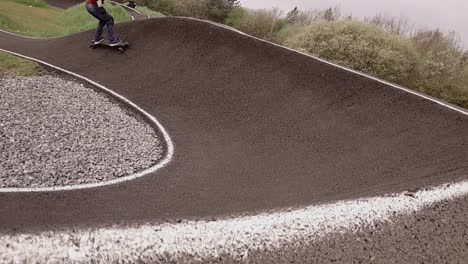 Eboarding-footage-around-a-BMX-pump-track