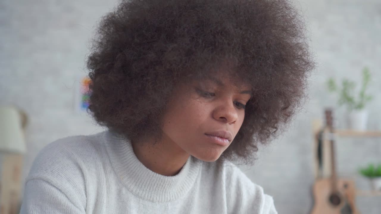 Portrait beautiful african american woman with an afro hairstyle