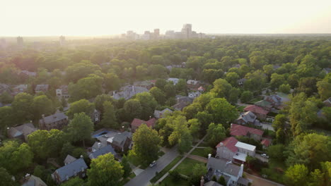 aerial of beautiful neighborhood at sunset with pan to the right