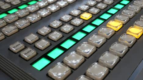 panoramic shot of broadcast video mixer buttons details, closeup - portugal