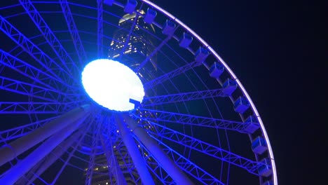 china night illumination hong kong city famous ferris wheel crowded panorama 4k