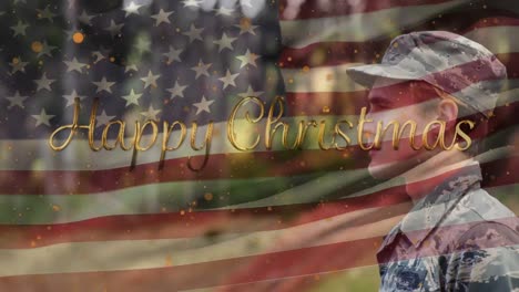 animation of happy christmas text and caucasian male soldier over flag of usa