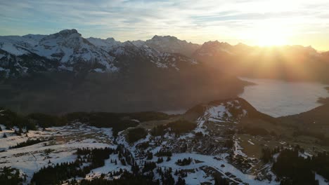 amden weesen switzerland village and lens flare of sunset