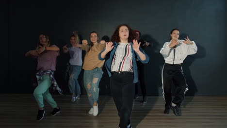 group of young women dancing hip-hop