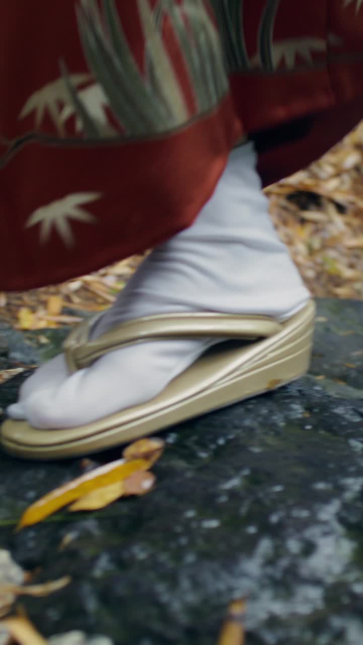 Japanese Woman in Kimono in a Garden