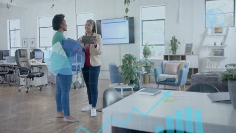 Data-processing-on-interface-over-diverse-female-colleagues-discussing-at-casual-office