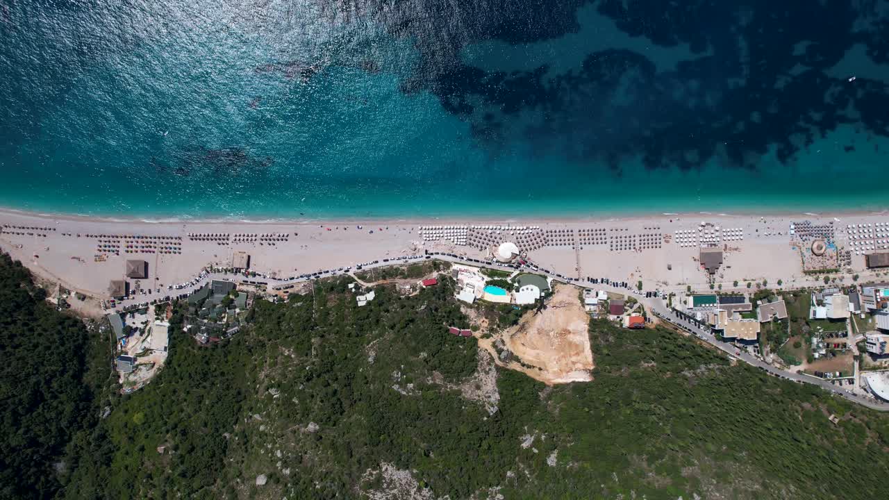 Dh&euml;rmi Delight: Vast Beach on the Beautiful Albanian Riviera, an Inviting Haven for Tourists to Unwind and Embrace Vacation Bliss