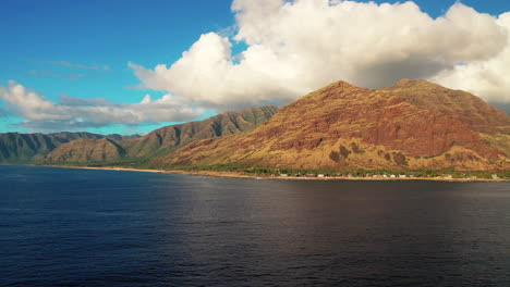 panoramic view of the coastline and mountains on the west side of the island of oahu hawaii united states - forward panning shot