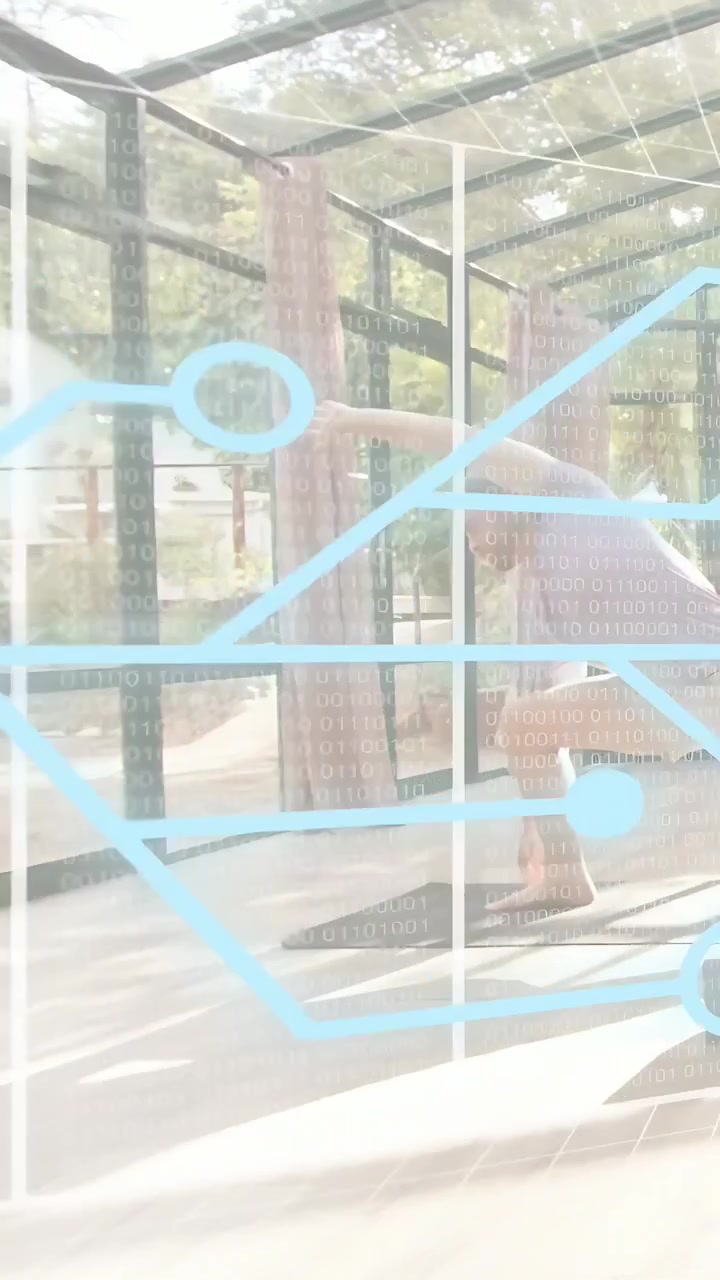 Vertical video: Man starting reach and flowing yoga for mobility, blue circuit overlay tracking him