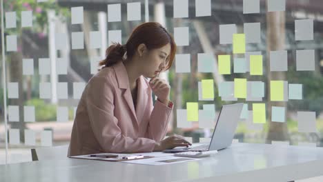 a young woman working with a laptop in a coffee shop business idea financial girl accountant