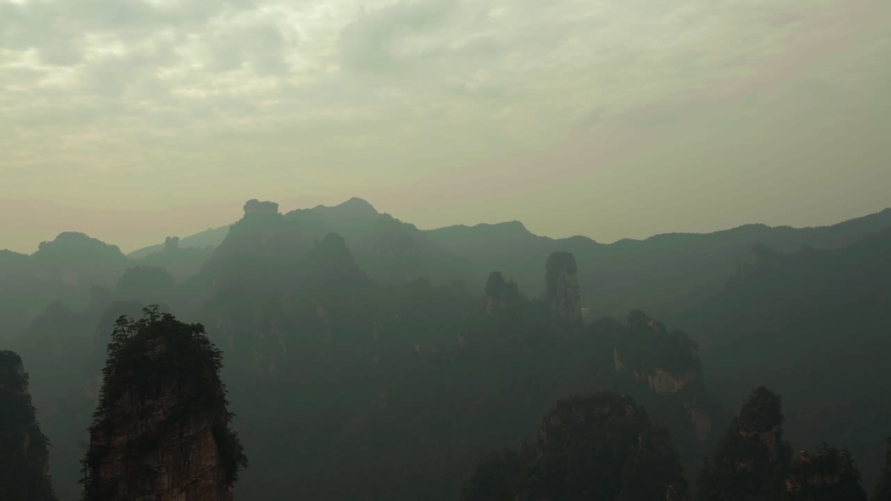Panoramic View of Layers of Misty Zhangjiajie Mountains