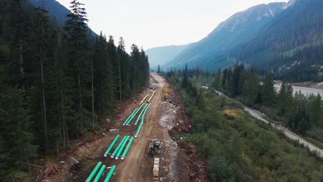 drone shot of the trans mountain pipeline next to the coquihalla highway in british columbia, canada