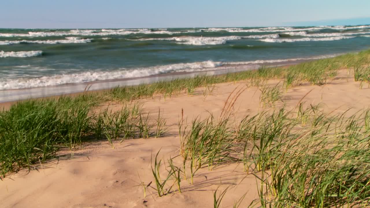 Crashing Waves On A Breeze Day At Indiana Dunes National Park, USA. Wide Shot