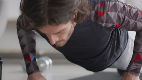 man doing push-ups at home