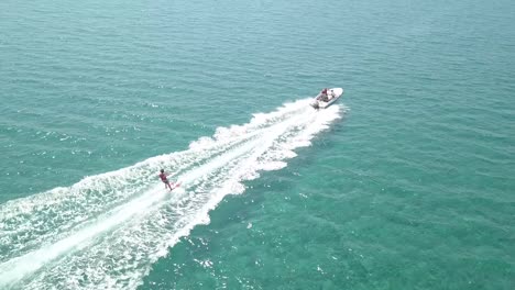 Tracking-shot-Of-Person-Enjoying-Water-Activity-During-Summer-Season,-Cyprus