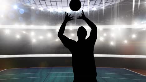 Animation-of-silhouette-of-male-volleyball-player-with-ball-over-sports-stadium