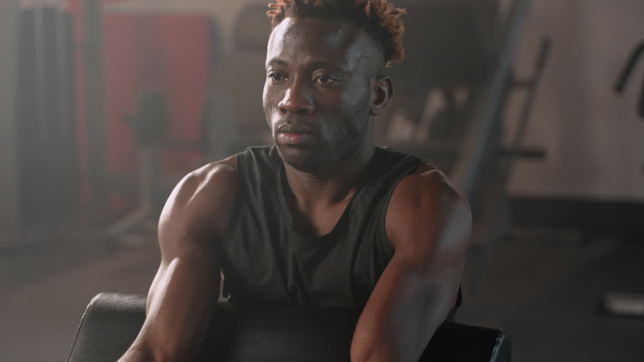 Man Working Out in Gym