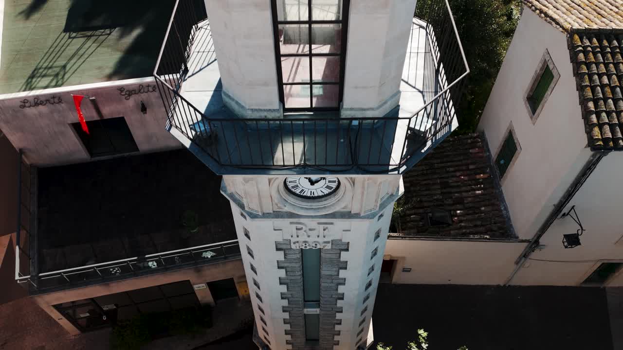 Aerial Ascent: Drone's Close Flight Along Valergues Village Clock
