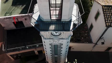 aerial ascent: drone's close flight along valergues village clock