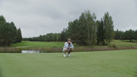 man playing golf on a golf course