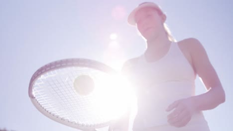 Active-sportswoman-practicing-tennis