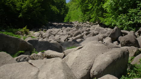 Felsenmeer-in-Odenwald-Sea-of-rocks-wood-nature-landscape-tourism-on-a-sunny-day-steady-wide-shot