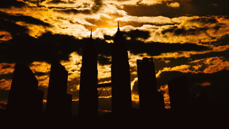 silhouette of kuala lumpur cityscape at sunset