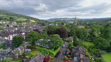 Aerial-footage-of-Ambleside-the-Lakeland-town-and-former-civil-parish,-now-in-the-parish-of-Lakes,-in-Cumbria,-in-North-West-England