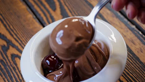 chocolate ice cream and cherries dessert