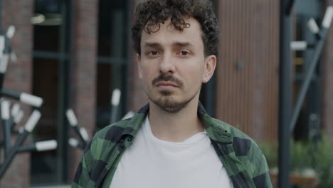 man in plaid shirt portrait