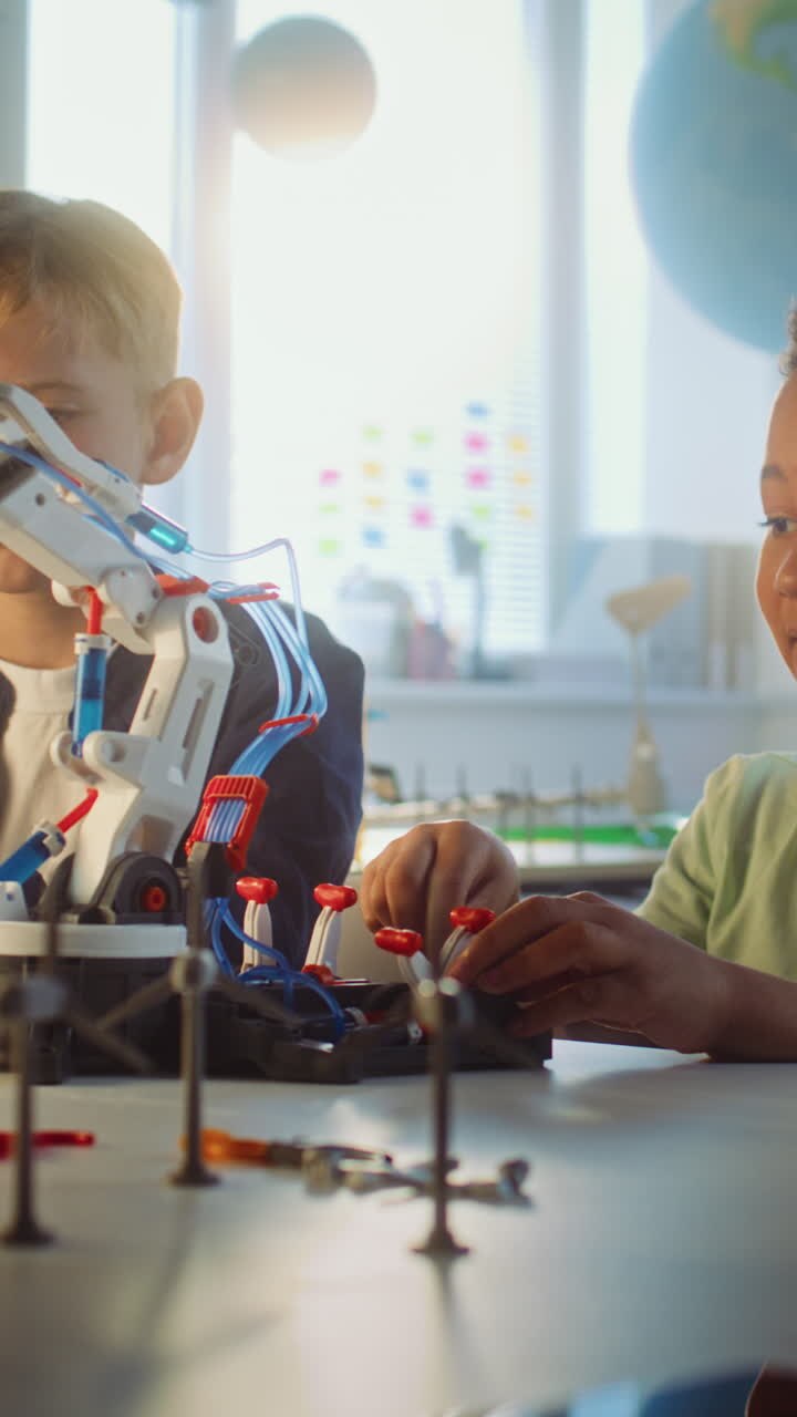 Children building robots in a classroom