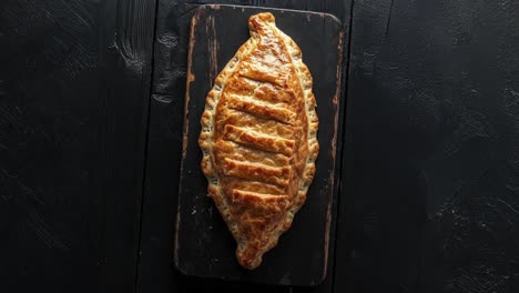 Golden-Baked-Pastry-On-Rustic-Wooden-Board