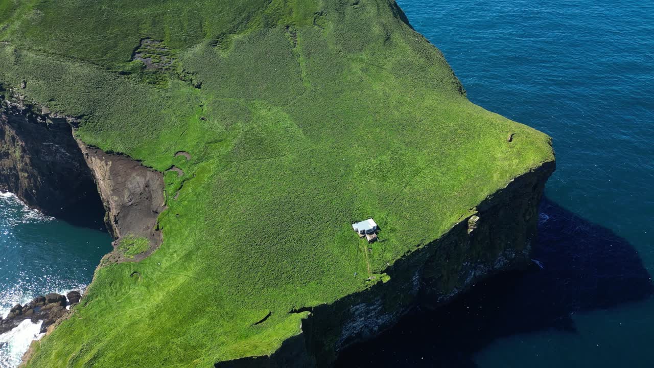 Aerial view of the loneliest house in the world, Vestmannaeyjar iconic landmark, south Iceland