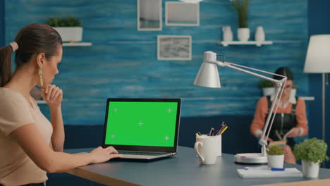 Woman-working-at-businees-project-for-company-using-laptop