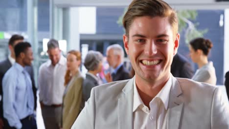 Smiling-businessman-in-office