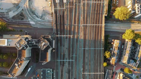 flying over the busiest central train station in utrecht, empty during lockdown implementation in netherlands due to coronavirus outbreak