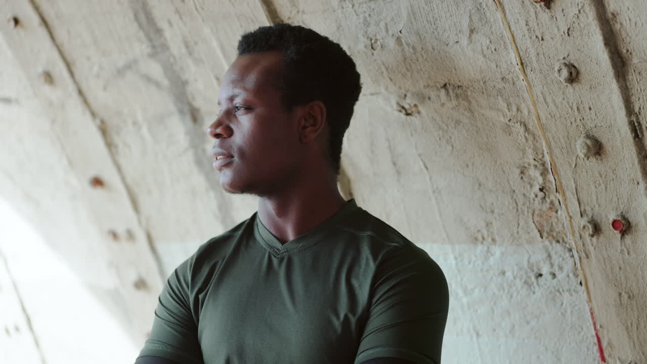 Thinking, outdoor and black man with fitness