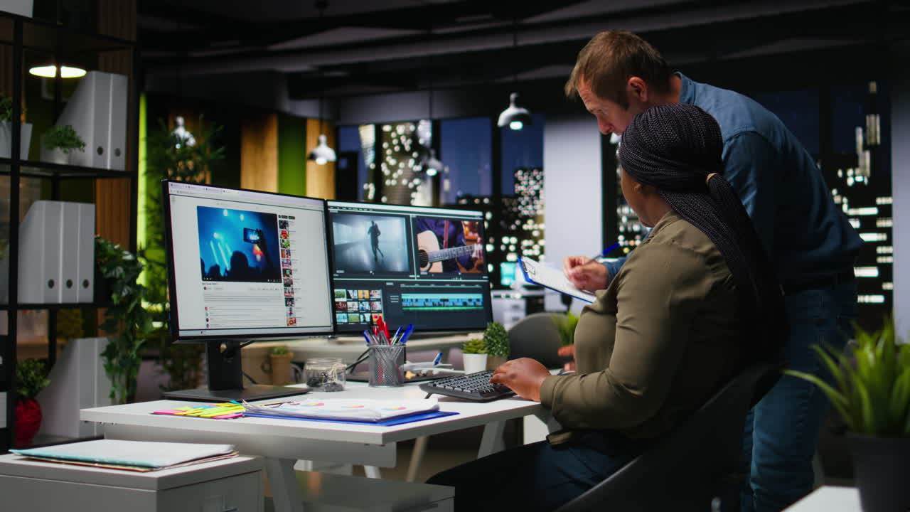 Man and woman filmmakers editing video shoot in post production