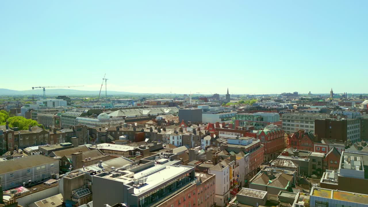Rising aerial of Dublin City Centre, Leinster, Ireland on a bright and sunny day. Filmed in 4K, 60FPS and with Rec709 color.